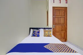 SPOT ON 90577 Griya Afifah Syariah - Habitación