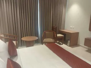 Hotel Kottayam Grand - Chambre
