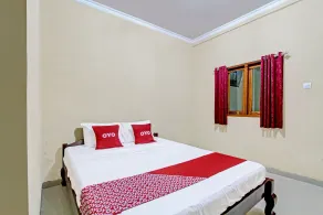 OYO 91353 Hotel Surya Andesa - Chambre