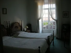 União - Guest House - Chambre