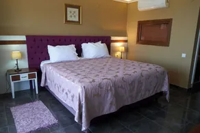 Phellos Suites Boutique Hotel - Habitación
