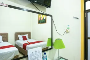 RedDoorz @ Gatot Subroto Ende - Zimmer