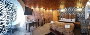 Hotel Temático Casa Puebla - Habitación