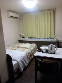 Sunshine Hotel - Chambre