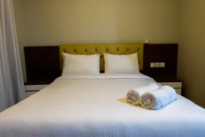 Amazing 2BR with City View The Wave Kuningan Apartment By Travelio - Værelse