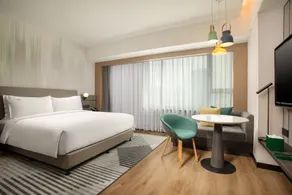 Holiday Inn Shanghai Nanjing Road by IHG - Zimmer