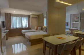 Valero Grand Suites by Swiss-Belhotel - Chambre