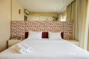 Trendy & Relaxing 2BR at The Suite Metro Apartment By Travelio - Room