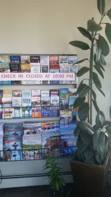 Swiss Cottage Inn - Inchecknings- och utcheckningsdisk