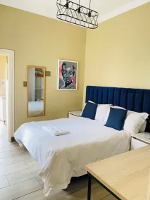 Henry George Guesthouse - Værelse