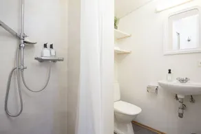 Brattagata Guesthouse Apartments - Baño