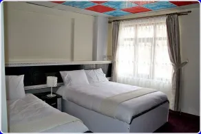 Konerkon Otel Plaza - Habitación
