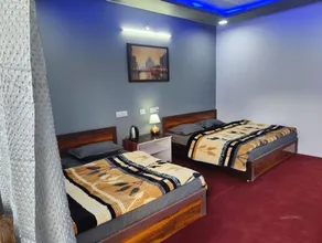Triyuginarayan Maangal Resort  - Chambre