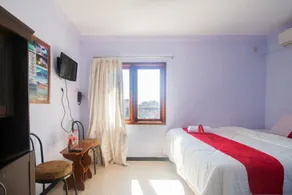 RedDoorz near Pantai Boom - Chambre