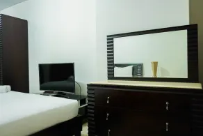 2BR with Study Room at L'Avenue Apartment - Habitación