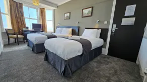 The Strand Hotel - Chambre