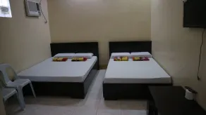 Pabua's Cottages - Chambre