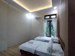 Saira Hotel dan Homestay Syariah - Chambre