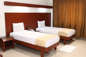 Dhanunjayas Luxury Hotel - Chambre