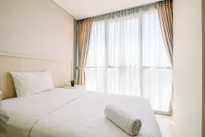 Spacious and Warm 2BR at Ciputra World 2 Apartment By Travelio - Zimmer