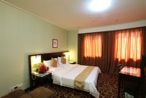Xin Hua Hotel Guangzhou - Chambre