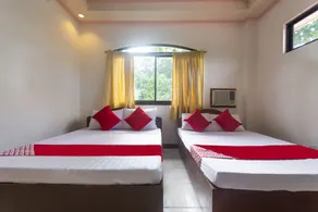 RedDoorz at Coco Grove Tourist Inn - Habitación
