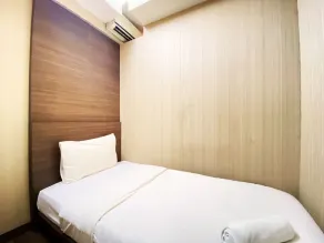 Modern and Cozy Stay 2BR Apartment at Gateway Ahmad Yani Cicadas By Travelio - Zimmer