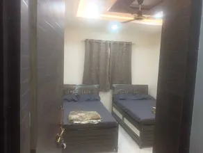 Hotel Kulswamini Inn - Room