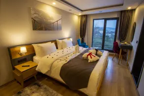Şehrar Suite Hotel - Zimmer