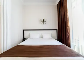 Corona Hotel & Apartments - Room