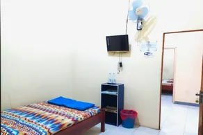 Wisma Air Mancur Malang Syariah Mitra RedDoorz - Værelse