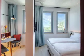 Merveilleux studio adapté aux familles avec terrasse et jardin - Vue de la chambre