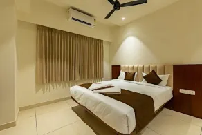 Patel Comforts Inn & Suites - Room