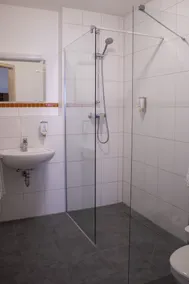 Orange Hotel und Apartments - Salle de bain
