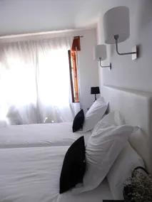 Hostal Carlos V - Zimmer