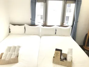Osaka Sinsei Guest House - Quarto