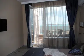 Appartement adapté aux familles avec jardin | Vue mer | Plage à proximité - Vue de la chambre