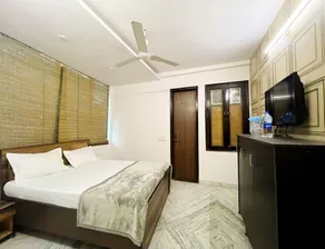 Roomshala 171 JP House - Chambre