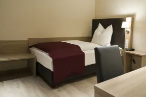 Troll's Brauhaushotel - Chambre
