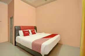 Hotel O Efniati Homestay Syariah - Chambre