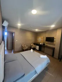 Joi Suites Hotel - Chambre