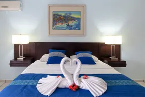 Stunning condo with brilliant views, walk-in shower, desk, balcony, & W/D - Room