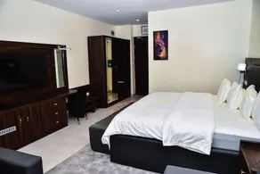 3pple M Continental Hotel & Suites - Zimmer