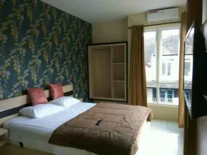 Urbanview Hotel Omah Anin Batu by RedDoorz - Chambre