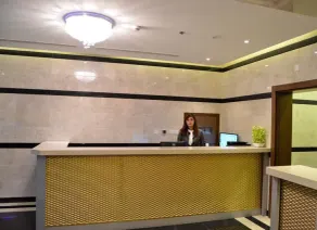 OYO 104 Q House 3 Apartments - Reception