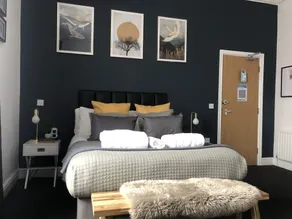 The Metropolitan Guest House - Zimmer
