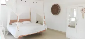 THE VILLAGE INN Rua Beach  - Chambre