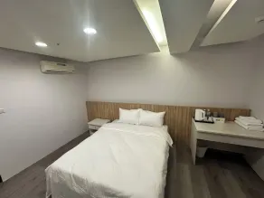 Xingyi Hotel - Room