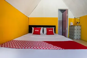 Cigadog Residence Mitra Reddoorz - Zimmer
