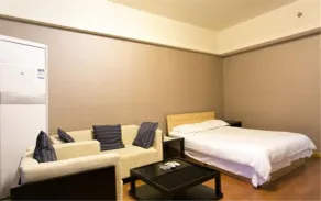 Tiandi Huadian Apartment Boya - Quarto